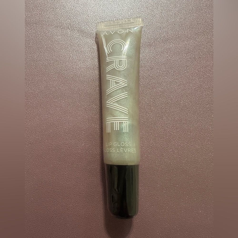 New sealed Avon Crave lip gloss Cucumber Spritzer.